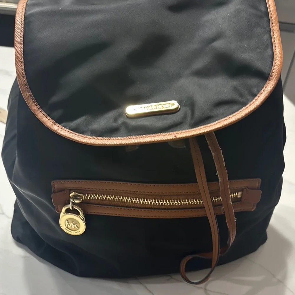 Michael Kors Black and Tan Backpack with Leather Accents